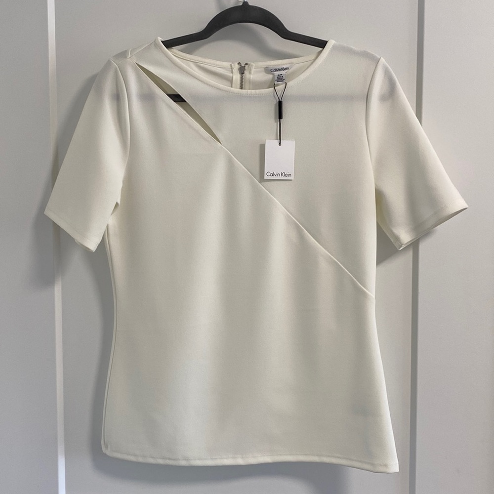 CALVIN KLEIN White Top, Small with cut out style on left shoulder blade.
